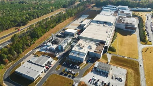 Aerial View of New Big Factory Complex for Producing and Shipping of Industrial Equipment Global