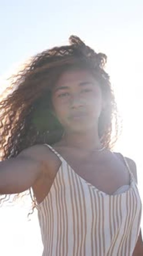 Attractive Woman Posing in the Sunlight