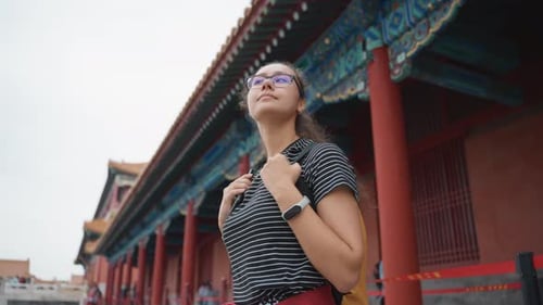 Adventurous Female Visitor Studying Temple Structures Female Explorer Capturing Candid Shots of