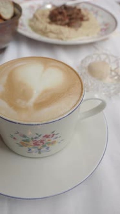 Perfect Latte Art with Heart Shape in a Cozy Cafe