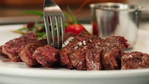 Beef Angus Steak in Restaurant Close Up Pieces of Hot Ribeye Steak Served on the Wooden Board Medium