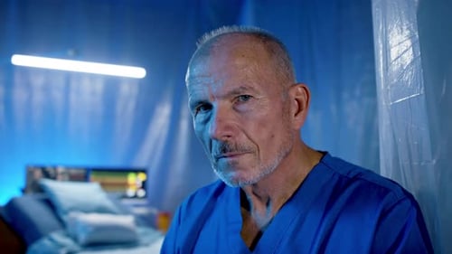 Frustrated Doctor by Empty Bed in Hospital, Coronavirus Concept