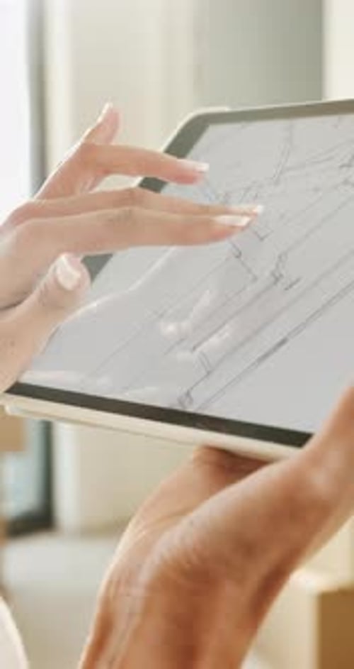 Hands, scroll and tablet screen with blueprint for renovation, construction