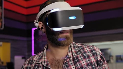 Adult Smiling Wearing a Virtual Reality Headset