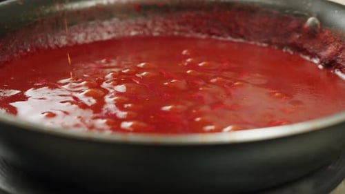 Red Sauce Simmering in a Pan