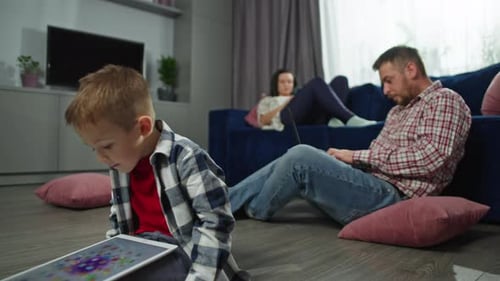 Family Members Using Technology at Home