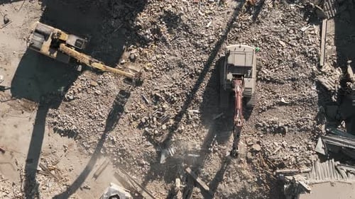 Demolition of the Building Excavator Working Rubbish in a Demolition siteDrone Footage of Destroyed