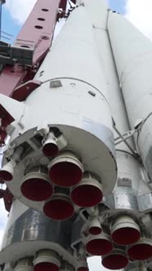 View of Bottom of Rocket on Background of Sky Action Realistic Monument of White Vostok Rocket with