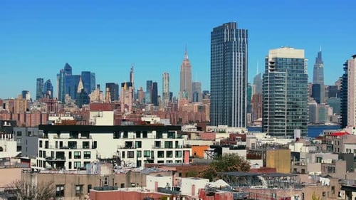 Vibrant Brooklyn Neighborhood with Low Buildings and Modern Skyscrapers in New York City Empire