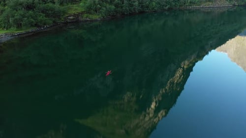 A kayaker in naeroyfjord Norway