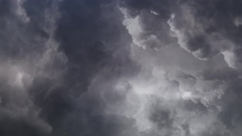 4k view of flying through in gray clouds with thunderstorm