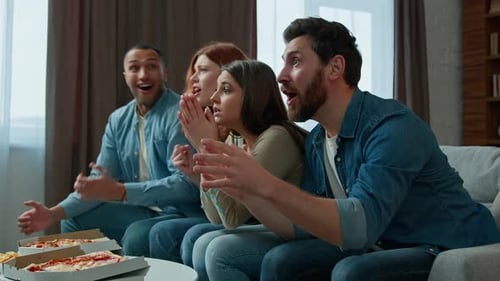 Friends Watching Sports Game, Cheering on Couch