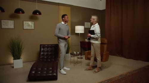 Man Talking to Therapist in Office