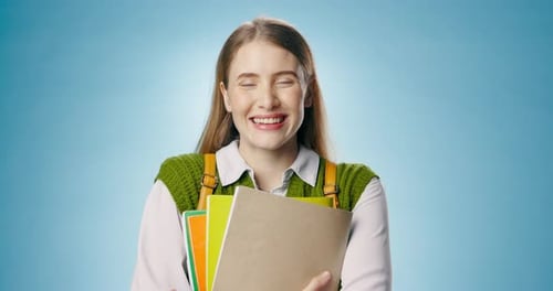 Education, university or face of girl with books in studio for learning