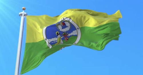 Waving Fejér County Flag Animation Against Blue Sky