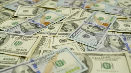 Pile of United States One Hundred Dollar Bills