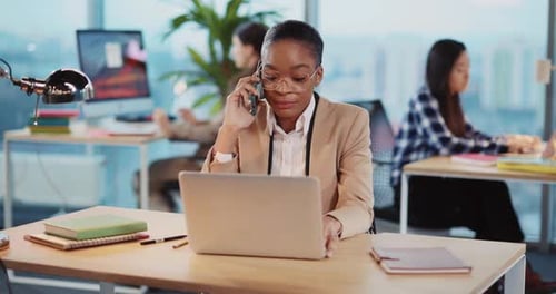Black Young Professional Woman Working at the Office Talking Mobile Phone Business Conversation with