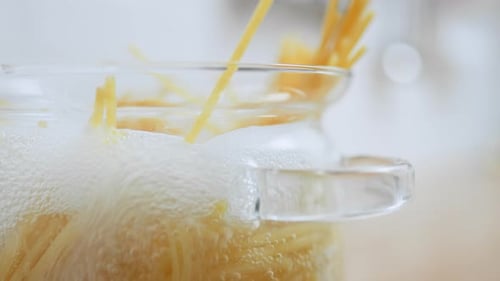 Yellow Spaghetti Durum Wheat Pasta Is Boiled In Transparent Glass Pan Water Boiling Boiled Spaghetti