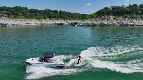surfing behind a boat at lake travis