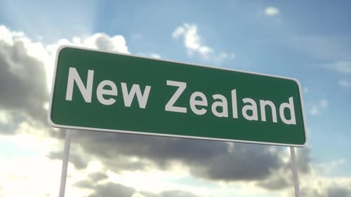 Welcome to New Zealand road sign on blue sky with clouds