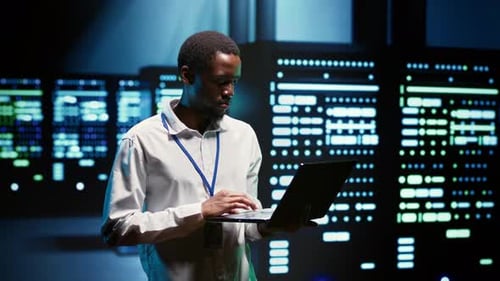 Technician Servicing Data Center