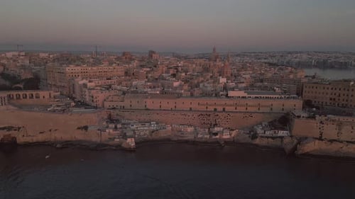Aerial footage of Valletta, Malta during evening in spring