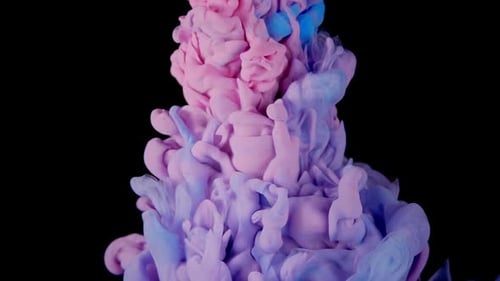 Blue and Pink Ink Flowing in Water
