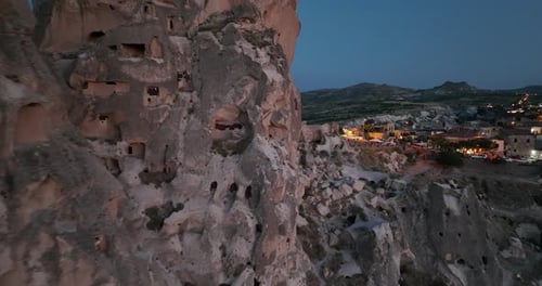 Aerial View of Natural Rock Formations in the Sunset Valley with Cave Houses in Cappadocia Turkey