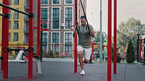 Athlete Powerful Man Latina African Muscular Guy Doing Legs Sport Exercise on City Sports Ground