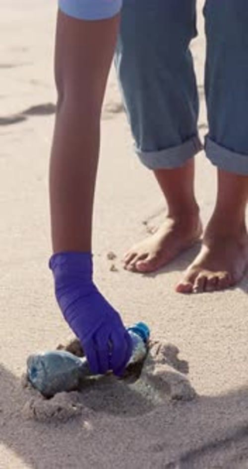 Volunteer, plastic and cleaning beach for pollution activism for community service