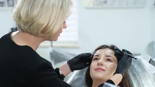 Eyebrow Shaping in Beauty Salon Treatment Room