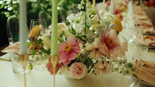 Floral Table Setting with Candles for Elegant Event