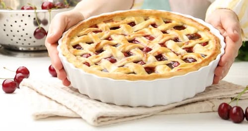 Homemade Cherry Pie Presented with Fresh Mint