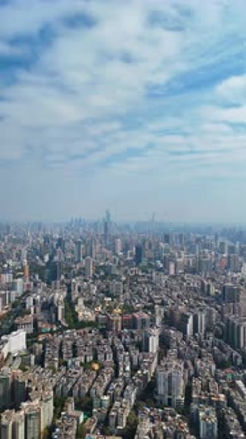 Vertical aerial view of Guangzhou’s cityscape during the day, China