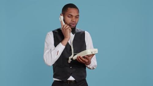 Adult Man on Telephone Wearing Formalwear