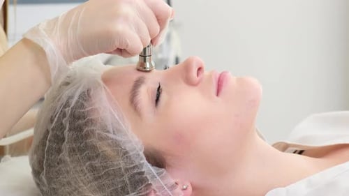 Cosmetic Facial Skin Rejuvenation Procedure at a Cosmetologist in a Clinic