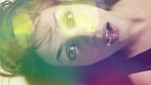 Woman Eyes Opening Closing with Light Flares