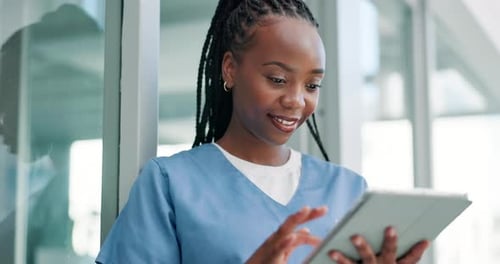 Nurse, typing on tablet and hospital or clinic research, online planning