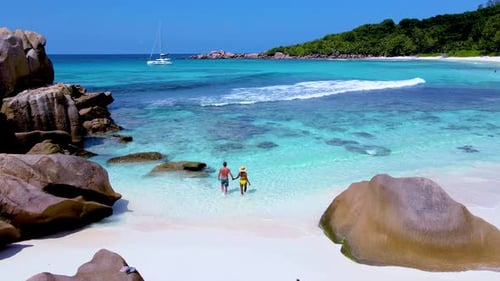Discovering the Pristine Beaches and Turquoise Waters of Seychelles on a Sunny Day