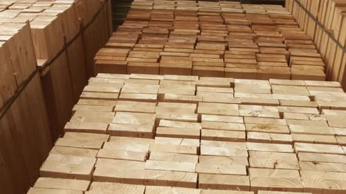 Stacks of Cut Wood Planks at Lumberyard