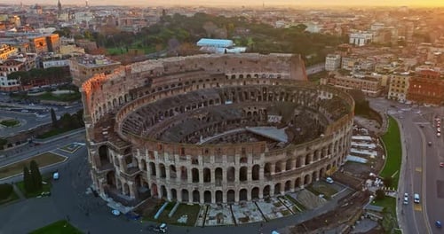 Aerial View of Iconic Ancient Arena of Colosseum at Sunset Flavian Amphitheatre in the Heart of Rome