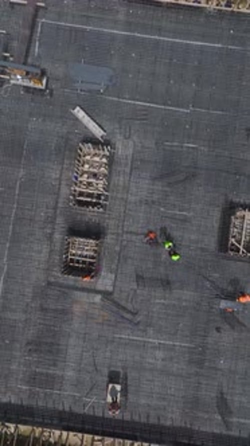 Aerial View of Workers on Construction Site