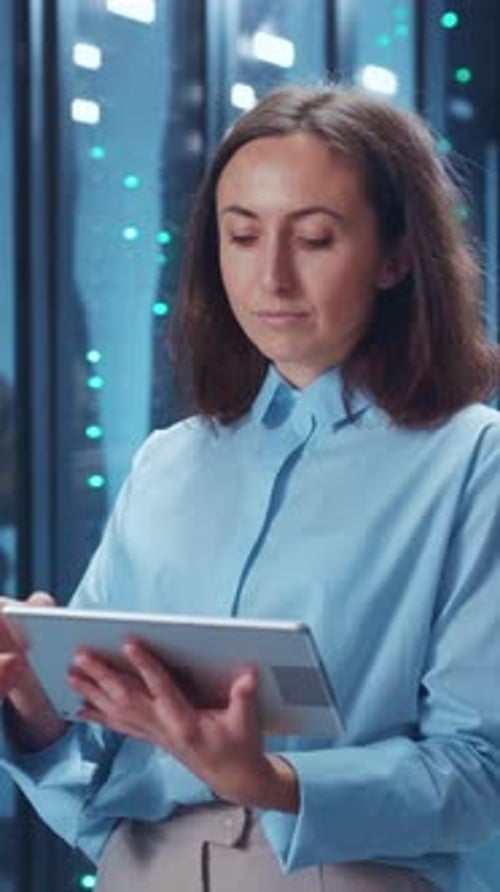 A Professional Woman Engaged with Her Tablet in a Contemporary Modern Setting or Office