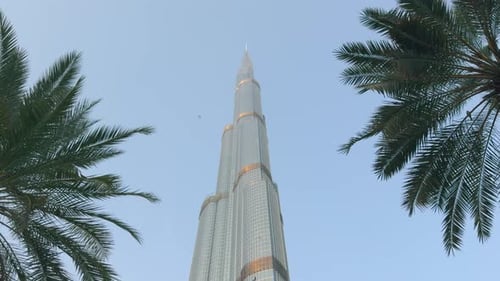 Low angle view of Burj Khalifa in Dubai, UAE. Action. The tallest building in the world and famous