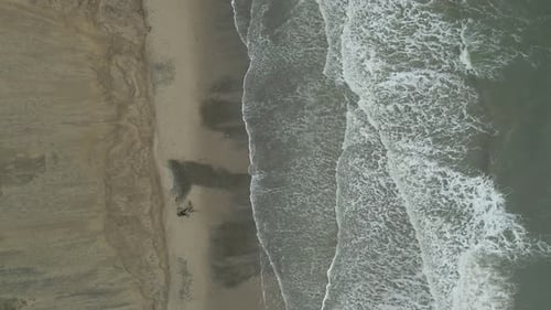 Waves Splashing On Pale-sand At Curracloe Beach On Stormy Weather In County Wexford, Ireland. aerial