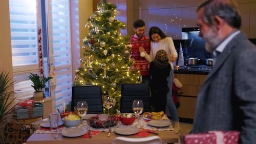 Festive Family Decorating Christmas Tree at Home