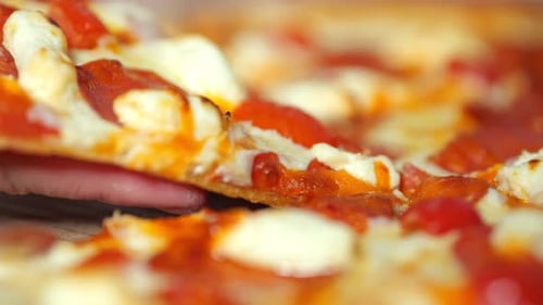 Close Up Slice of Pepperoni Pizza