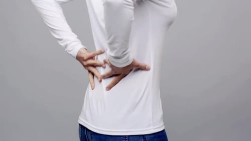 People, Healthcare And Problem Concept - Woman Suffering From Pain In Back Or Reins