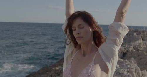 Carefree Boho Female Posing in Nature by Sea