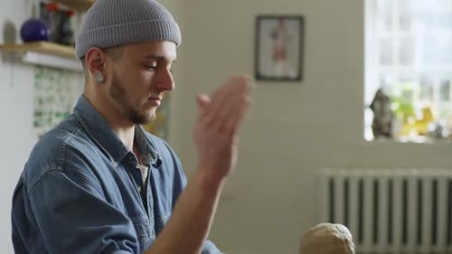 A Ceramist Artist Makes Clay Products in a Workshop